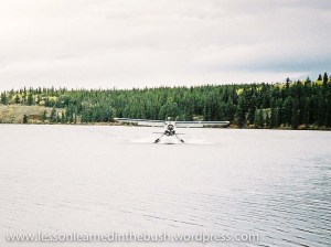 Al landing his Cessna on Trout Lake